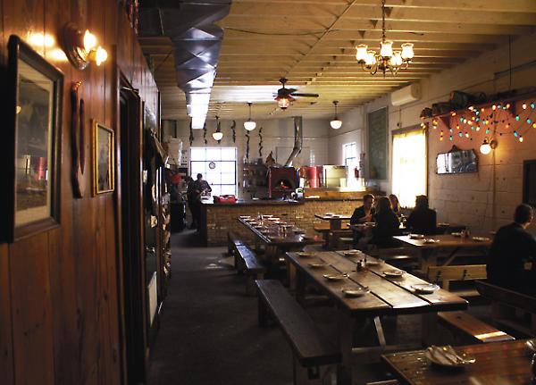 interior view, salvaged wood tables and walls